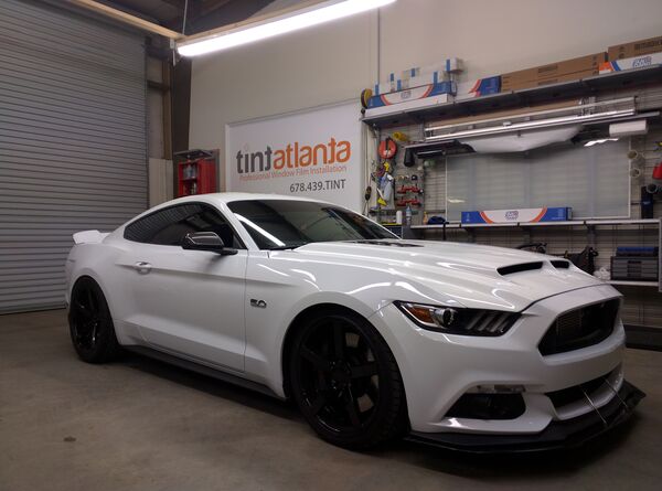White Ford Mustang GT 5.0 with ceramic window tint installation at Tint Las Vegas Las Vegas
