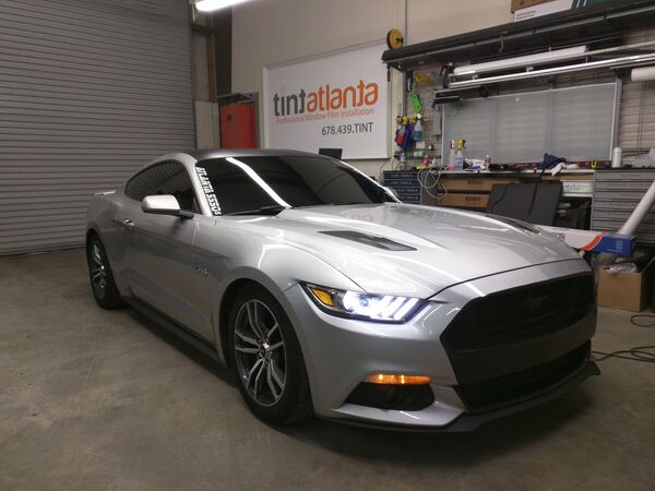 Silver Ford Mustang GT with dark ceramic window tint in Las Vegas NV