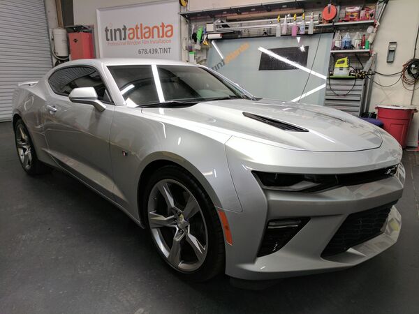 Silver Chevrolet Camaro SS with dark window tint installation Las Vegas